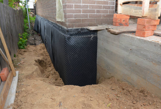 Happy homeowners after waterproofing job in South Milford